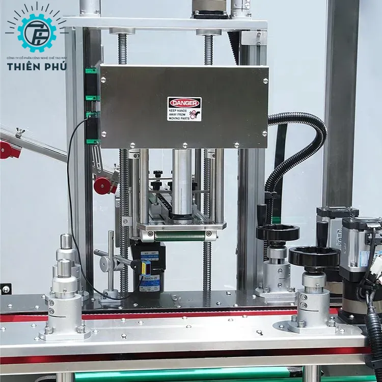 may dong nap chai dau goi giam dau oliu 02