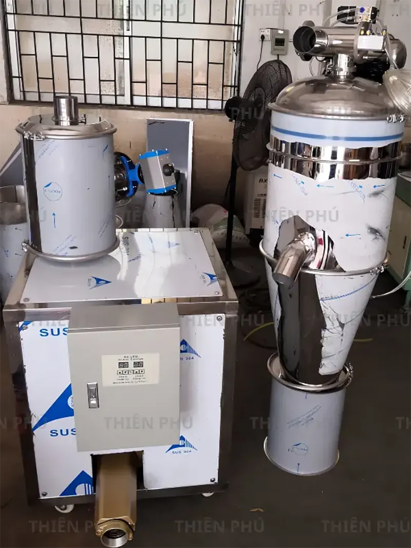 bàn giao máy cấp liệu chân không tại Long An