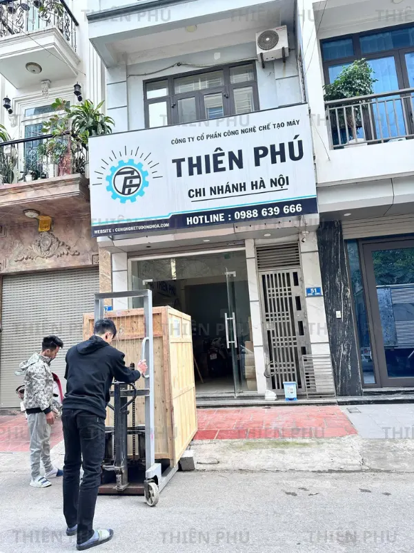 bàn giao máy đóng gói phở cho công ty NADISA