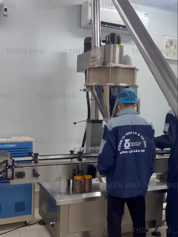 bàn giao dây chuyền chiết rót bột cà phê cho công ty HM
