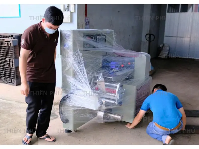 bàn giao máy đóng gói nằm ngang cho công ty Cacao Trọng Đức