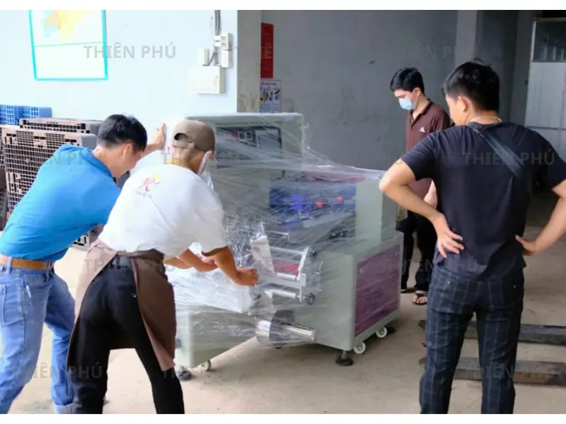 bàn giao máy đóng gói nằm ngang cho công ty Cacao Trọng Đức