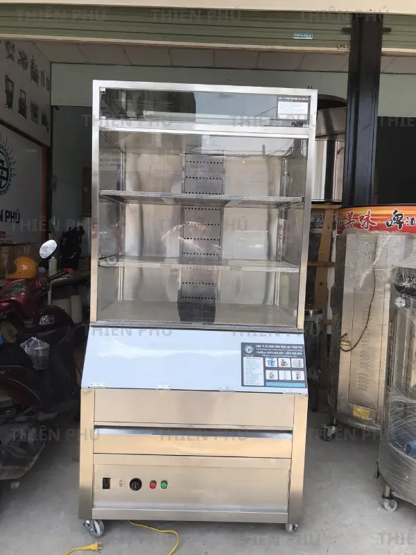 bàn giao tủ trưng bày bắp rang bơ cho công ty Goldenduck